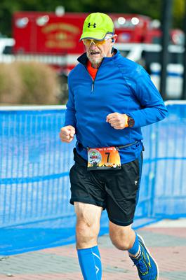 Crossing the finish line of my first marathon (2016)!